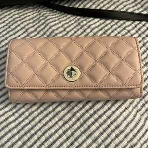 Kate Spade light pink quilted wallet. Standard size long wallet. Never used.